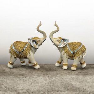 Drunk Elephant Gold and Silver Decorative Elephants